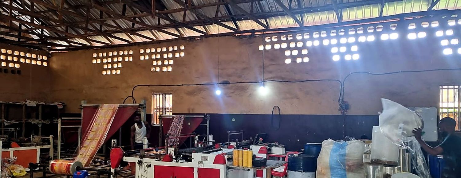 Bag sealing machine in operation at the Mimshak Pak facility in Asaba